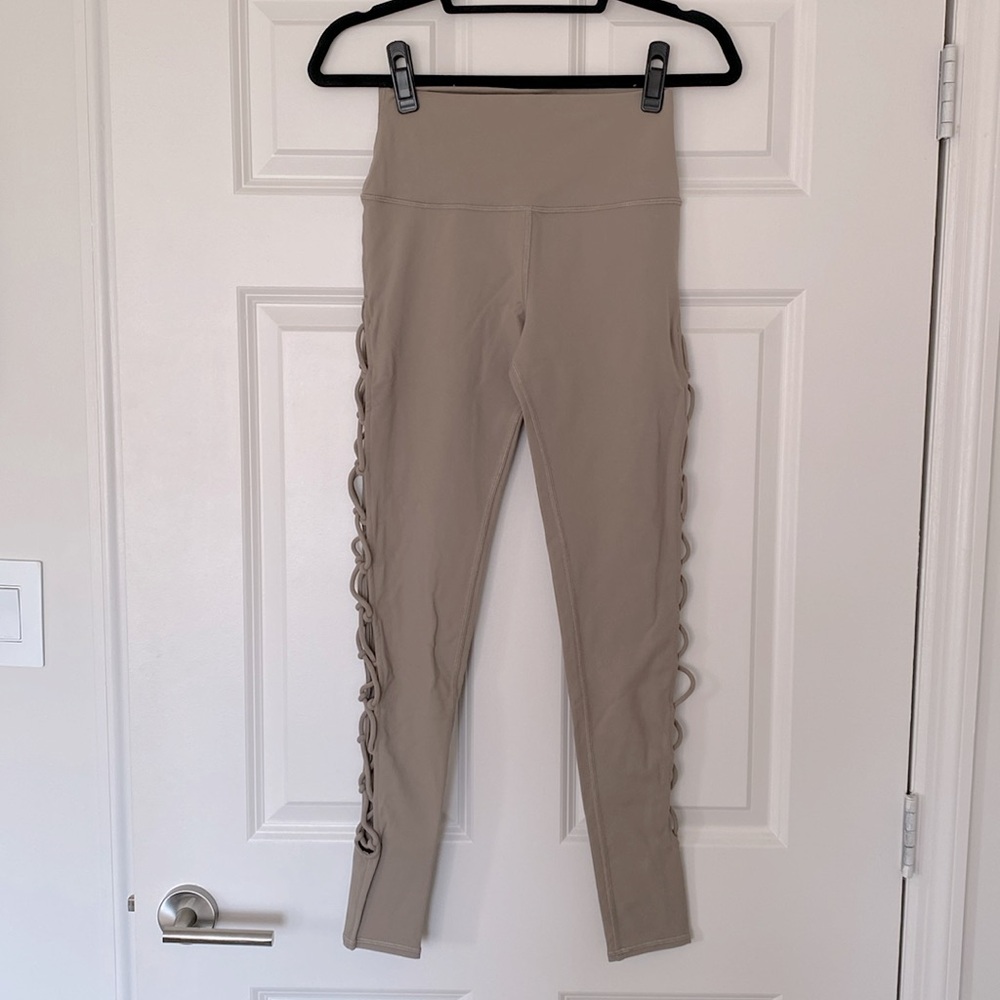 Alo Yoga tan leggings with lacing detail